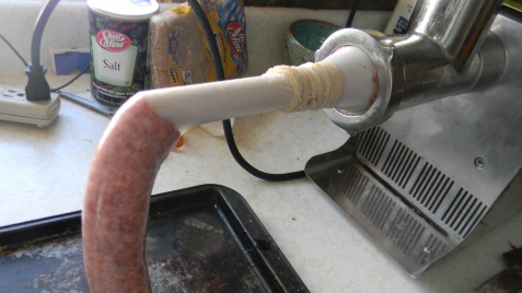 Sausage casing on the stuffing attachment